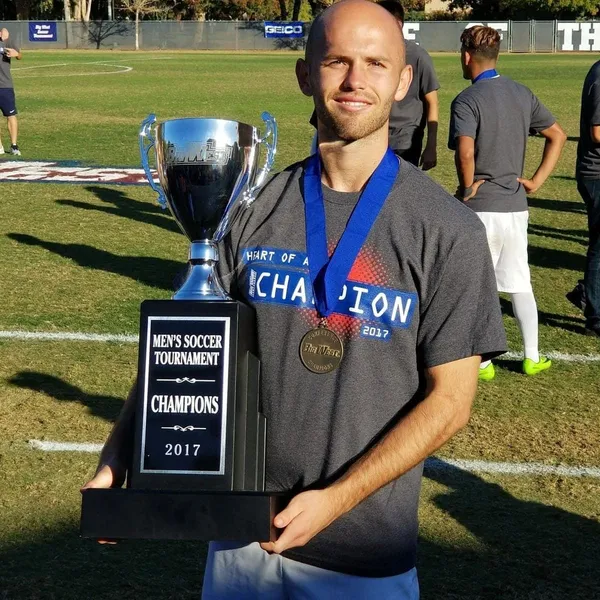 Youth football trophy celebration